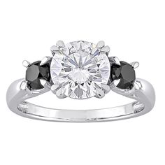 a three stone engagement ring with black diamonds