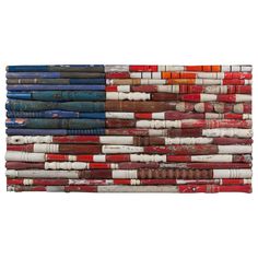 an american flag made out of books on a white background with red, white and blue colors