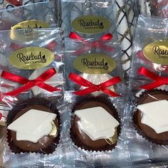 chocolates wrapped in plastic and tied with red ribbon