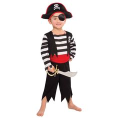 a little boy dressed in a pirate costume