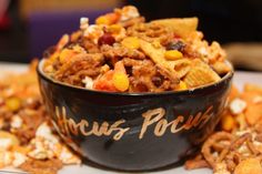 a bowl filled with cereal sitting on top of a table