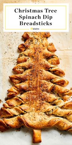 christmas tree spinach dip breadsticks on a baking sheet with text overlay