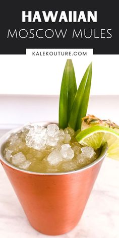 a drink in a copper cup with ice and garnish on the rim that says hawaiian moscow mules