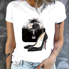 Graphic T-Shirt With Fashion Heels & Purse Theme.. Polyester/Rayon Mix. Super Soft & Comfortable. Runs True To Size. Nwot. Trendy T Shirts For Women, Kasut Tumit Tinggi, Floral High Heels, Trendy T Shirts, Beg Tangan, Fashion Heels, Plus Size Kleidung, Women Sleeve, Round Neck Tops