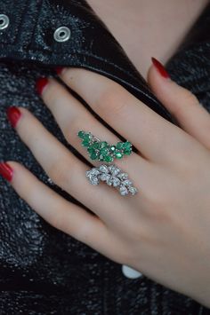 Magical piece! Features 1.98ct of Emerald and 1.44ct in diamonds. Set in 18K White Gold. 18K Gold: 12.34g Pear Diamond: 1.44ct - 15 pieces Emerald: 1.98ct - 15 pieces Measurements: 27mm x 37mm Size: 6 Natural, untreated gemstones Contact us to further customize SKU: RI1254 Luxury Marquise Emerald Ring With Diamonds, Luxury Marquise Emerald Ring, Luxury Cluster Emerald Ring With Diamonds, Luxury Multi-stone Emerald Ring With Diamonds, Exquisite Multi-stone Emerald Diamond Ring, Bypass Ring, Jewelry Website, Curated Design, Pear Diamond