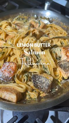 lemon butter salmon pasta in a skillet on the stove with a spoon and title overlay