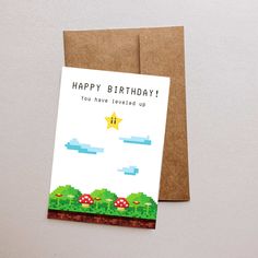 a birthday card with the words happy birthday you have traveled up in front of an image of mario