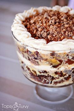 a close up of a dessert in a glass on a table