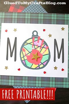 a mother's day card with the word mom on it and a christmas ornament