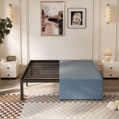 a blue and black bed frame in a white room with checkered floor tiles on the floor