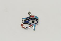 Eye of Horus , Handmade Egyptian sterling silver pendant inlaid with stones . The Eye of Horus is one of most known Symbols of Ancient Egypt. A striking and fabulous piece, demure and chic around the neck pendant is crafted using premium-grade Sterling silver. and hand engraved Please contact us if you have any question, thank you for visiting our shop.You can purchase this pendant only or with its chain Our official page https://www.facebook.com/fromegyptwithlove.epy/ Pluto Retrograde, Egyptian Pendant Jewelry, Adjustable Ankh-shaped Brass Jewelry, Anubis Ring Egyptian Jewelry, Enamel Jewelry Egyptian, Eye Of Horus Pendant, Ancient Egyptian Goddess, Queen Nefertiti, Star Eyes