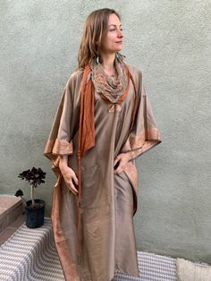 This beautiful desert shawl is a one of the kind creation. It can be worn as a headpiece, a belt, a scarf or a wrap. It comes with two detachable layers: a gauze cotton, hand-dyed by Lunara Love herself, and a stretch cotton jersey layer. This gorgeous beduin style desert scarf is lovingly hand crafted by Lunara Love of Lunara Design for our collaborative collection "Nomad Life" Being a nomad is like being a free spirit, a desert dweller who is ready to let go of the things that don't really mat Desert Scarf, Desert Dweller, Nomad Life, Beautiful Desert, Beige Scarf, Brown Scarves, Free Spirit, Stretch Cotton, Warm Weather