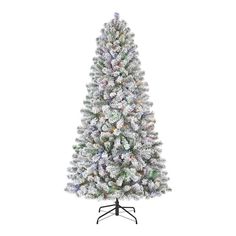 a white christmas tree with multicolored lights and snow flakes on the top