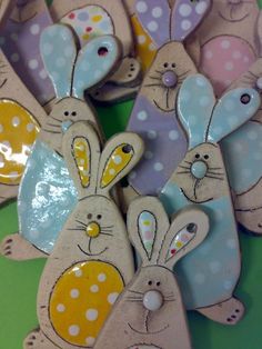 several wooden rabbits with polka dots on them