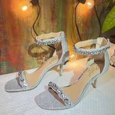 Retail Price: $118.95 * New Condition. Size: Us 6 Medium Fit: True To Size. Order Usual Size. Color: Silver 100% Glitter Made In Usa Or Imported Rubber Sole Heel Measures ~ 2.95" Lightly Padded Product Dimensions : 5 X 5 X 0.7 Inches; 10.4 Ounces Item Model Number : Jw3903 Date First Available : August 27, 2020 Manufacturer : Jewel Badgley Mischka 4.1 Out Of 5 24 Global Ratings On Amazon #1 Holiday Embellished Ankle Strap Heels, Embellished Fitted Sandals For Prom, Glamorous Low Heel Wedding Shoes For Cocktail, Sparkle Wedding Shoes, Jewel Badgley Mischka, Embellished Heels, Badgley Mischka Shoes, Gold Pumps, Satin Heels