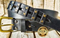 Elevate your everyday style with this stunning black leather belt, handcrafted by Ishaor. Made from high-quality genuine leather, this belt features a unique design that is sure to turn heads. The 3.6cm width makes it a versatile piece that can be dressed up or down. Features: Made from high-quality genuine black leather Unique design 3.6cm width Handmade by Ishaor Sizing: Please refer to the sizing chart in the photos to find the perfect fit. If you have any questions about sizing, please feel free to contact me. About Ishaor: Ishaor is a small business dedicated to creating high-quality, handcrafted leather goods. Each piece is made with care and attention to detail, using only the finest materials. Black Leather Belt Buckle With Brass Detail, Leather Belt With Brass Buckle As Gift, Black Leather Belt Buckles As Gift, Handmade Adjustable Leather Belt Buckles, Studded Belt, Black Leather Belt, Suspender Belt, Handcrafted Leather, Leather Goods