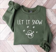 Let It Snow Sweatshirt, Womens Christmas Shirt, Winter Sweatshirt, Christmas Crewneck, Snowflake Sweatshirt, Snowman Shirt, Holiday Sweater Hi there, Welcome to Dolphin Custom Shirts!   We are a small family business and customer satisfaction is our top priority. Here at Dolphin Custom Shirts, We make quality shirts, sweatshirts, long sleeves, youth and toddler shirts and baby onesies at affordable prices. All of our items are printed in-house in the USA, we don't work with any 3rd party printin Cheap Trendy Winter Shirt, Cute Christmas Shirts Snow Flake, Let It Snow Somewhere Else Shirt, Let It Snow Shirt, Snowman Shirt, Christmas Party Shirts, Womens Christmas Shirts, Womens Christmas, Christmas Crewneck