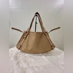 This Shoulder Bag Features A Canvas Body With Leather Trim, Flat Leather Straps, An Open Top, And Interior Zip And Slip Pockets. This Gucci Item Is 100% Authentic And All Purchases Over $500 Will Be Authenticated By Poshmark I Also Have Entrupy Device And Will Be Happy To Include A Certificate If The Order Is Under $500 And Not Going To Poshmark. Gold Monogram Canvas Shoulder Bag With Double Handle, Gold Monogram Canvas Shoulder Bag With Handles, Gold Monogram Canvas Satchel Shoulder Bag, Gold Monogram Canvas Shoulder Bag For Daily Use, Gold Monogram Canvas Shoulder Bag For Shopping, Chic Gold Monogram Canvas Shoulder Bag, Womens Tote Bags, Leather Trims, Leather Straps