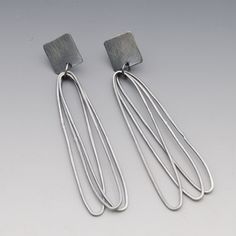 Paperclip Earrings by Jackie Jordan (Silver Earrings) | Artful Home | Silver Earrings Kinetic Earrings, Architectural Earrings, Paperclip Earrings, Simple Silver Earrings, Cage Ring, Art Jewelry Earrings, Contemporary Handmade Jewelry, Modern Silver Jewelry, Ear Art