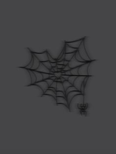 a black and white photo of a spider web on a gray background with the word halloween written below it