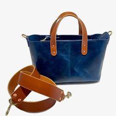 The Bella Crossbody Bag in Blue: Elegant, Durable, and Handcrafted Introducing The Bella Crossbody Bag—a stunning piece of craftsmanship, expertly made from one of the strongest leathers in the world: glazed full-grain water buffalo leather. Known for its incredible strength and unique pull-up effect, this leather develops a dazzling patina over time, making your bag truly one of a kind. Not only is buffalo leather extremely durable, but it is also highly resistant to weather and tearing, ensuri Blue Leather Rectangular Satchel, Blue Rectangular Satchel With Leather Lining, Blue Leather Shoulder Bag With Leather Lining, Blue Satchel With Leather Lining For Daily Use, Blue Leather Rectangular Bag, Blue Rectangular Leather Bag, Blue Bags With Leather Lining For Everyday Use, Blue Leather Tote Shoulder Bag, Blue Leather Shoulder Bag With Leather Handles