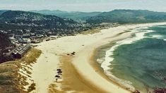 an aerial view of a beach and the ocean