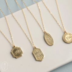 Bible Verse Pendant Necklace By Madison Sterling – Bella Vita Gifts & Interiors Brass Oval Pendant Necklace With Charms, Oval Pendant Necklace With Charms In Brass, Oval Pendant Brass Necklace With Charms, Brass Charm Necklace With Large Pendant As Gift, Gift Bronze Tarnish Resistant Necklace, Bronze Tarnish Resistant Necklace For Gift, Bronze Tarnish-resistant Necklace As Gift, Personalized Bronze Pendant Necklace, Scripture Necklace