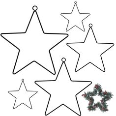 three star ornaments hanging from a christmas tree