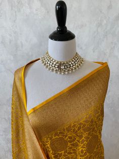 ShopNaya brings you exquisite handloom Banarsi pure silk collection from Varanasi, India. Banarsi is a labor of love, a luxury statement. It's a heavier saree with rich bold colors, hours of labor put together to make one fine saree. The weave, the craftsmanship is one of the finest in the world. Banarasi Katan Silk Saree in yellow. Body of the saree has beautiful rose motifs in antique zari. Pallu has solid band of antique zari with intricate geometric pattern. Color of the blouse is yellow wit Yellow Banarasi Saree Bridal, Yellow Banarasi Saree, Saree Yellow, Engagement Jewellery, Banarasi Katan Silk Saree, Haldi Outfits, Banarsi Saree, Saree Jewellery, Katan Silk Saree