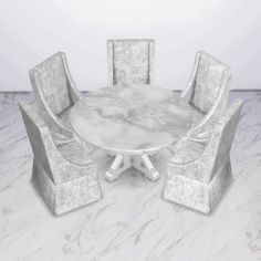 a round table with four chairs around it on a white marbled flooring area