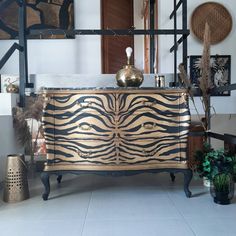 a zebra print dresser in a living room