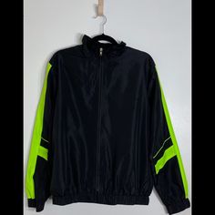 Super Cute Windbreaker, Kinda Has An Oversized Fit. Brand New With Tags Never Worn And Has No Flaws. Bright Neon Green Contrast Design Along Sleeves. Can Fit Sm-Med. Black Long Sleeve Track Jacket With Contrast Panels, Black Track Jacket With Contrast Panels For Fall, Black Winter Windbreaker With Color Block, Black Color Block Windbreaker For Winter, Black Track Jacket With Contrast Color, Black Casual Track Jacket With Contrast Color, Casual Black Track Jacket With Contrast Color, Black Color Block Track Jacket For Fall, Black Track Jacket With Contrast Panels For Streetwear