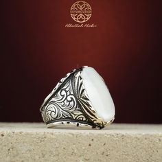 Stone Type: Mother of Pearl -Stone Dimensions: 1.8 cm x 2.5 cm -Metal Type: Sterling Silver(925k) & Bronze Details (Yellow Part) -Weight of the Item: 25 gr (Approx.) All items comes in a special gift box. If you don't see your size, please ask, we may produce your size. You are looking at the high quality handcrafted silver ring. All of our items have been designed and produced by ourselves ,so all our items comes with 1 year warranty as well. White Luxury Jewelry With Polished Finish, Luxury White Jewelry With Polished Finish, Luxury Sterling Silver Opal Ring With Polished Finish, Luxury White Moonstone Ring, Luxury White Opal Ring For Gift, Luxury White Signet Ring With Polished Finish, Classic White Oval Dome Ring, Formal White Opal Ring, Luxury White Moonstone Ring With Polished Finish