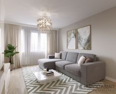 a living room filled with furniture and a chandelier