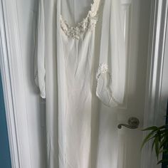 Never Worn Beautiful White Nightgown And Matching Robe. Embroidery On Nighty And Robe. Pictures Do Not Do It Justice. Very Beautiful!!!! This Beautiful Set Will Really Show Off Your Tan!!!! Long Sleeve Lace Nightgown For Sleep, Long Sleeve Lace Trim Nightgown For Wedding, White Lace Long Sleeve Nightgown, Wedding Nightgown With Lace Trim And Long Sleeves, Long Sleeve Lace Trim Wedding Nightgown, Sheer V-neck Sleepwear For Wedding, V-neck Robe With Lace Trim For Wedding Night, Sheer V-neck Wedding Sleepwear, Sheer V-neck Nightgown For Wedding Night