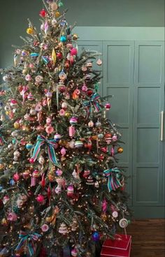 a decorated christmas tree in a room