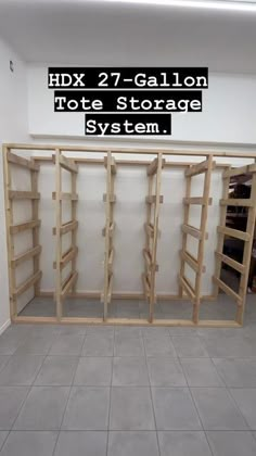 an empty storage room with shelves in it