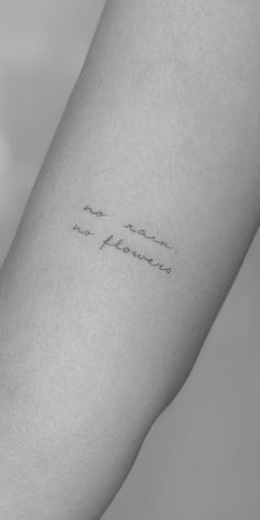 a woman's arm with the words i am not perfect written in cursive font