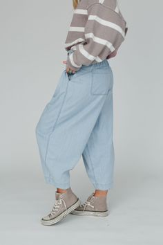 Relaxed and easygoing feel, these pants are the epitome of casual boho chic, the Cool Touch Pleated Pants are the perfect airy touch for your wardrobe! You'll love these laid - back stylish pants because they feature: Comfortable, lightweight, Cotton denim fabric Relaxed and loose tapered wide leg silhouette at a cropped length High - rise waistline with a button and zipper front closure, an elastic back detail, and belt loops Cute pleated front details for an added touch Convenient side pockets Baggy Medium Wash Cargo Pants, Casual Baggy Medium Wash Pants, Baggy Denim Blue Pants For Spring, Baggy Light Wash Summer Bottoms, Relaxed Straight Leg Bottoms With Pull-on Style, Summer Light Wash Baggy Bottoms, Relaxed Straight Leg Pull-on Bottoms, Relaxed Pull-on Straight Leg Bottoms, Casual Medium Wash Pants For Spring