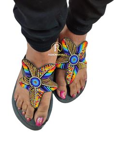 African Sandals. Made using high quality leather And beads. Multicolor Open Toe Slingback Sandals For Beach, Handmade Round Toe Sandals For Beach, Multicolor T-strap Sandals With Round Toe For Beach, Multicolor Toe Loop Sandals For Vacation, Multicolor Open Toe T-strap Sandals For Vacation, Handmade Slip-on Sandals For Summer, Multicolor Toe Loop Sandals For Summer, Handmade Adjustable Slip-on Sandals, Multicolor Open Toe Huarache Sandals For Beach