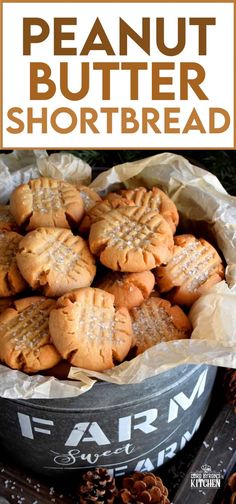 peanut butter shortbread cookies in a bowl with pine cones on the side and text overlay