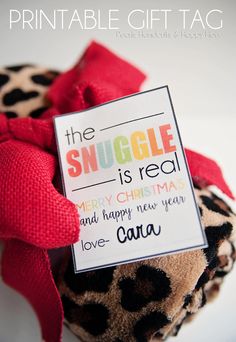 the snuggle is real and happy new year's eve gift tag on a stuffed animal