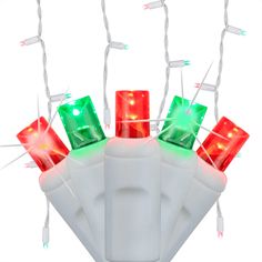 christmas lights with green and red bulbs on white wire, isolated against a white background