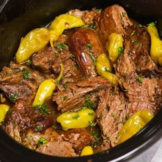 the meat and peppers are being cooked in the slow - cooker to be eaten