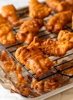 some fried food is cooling on a rack