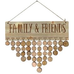 a wooden sign that says family and friends hanging from a string with lots of circles