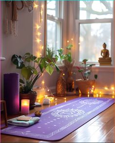 a yoga mat sitting on top of a wooden table next to a potted plant