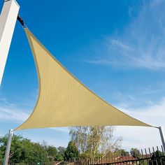 an outdoor area with a large shade sail