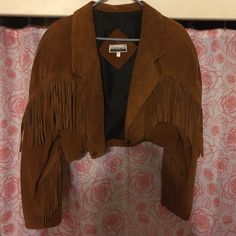 This Is A Gorgeous Size 9 Crop Leather Jacket. Purchased But Never Worn. In Great Condition, Has Two Flaws Though, A Hole In The Back, As Well As One Of The Tassels Was Ripped Off. This Jacket Though Brown Leather Long Sleeve Cropped Jacket, Brown Leather Cropped Jacket With Long Sleeves, Crop Leather Jacket, Fringe Leather Jacket, Cropped Leather Jacket, Black And Brown, Tassels, Leather Jacket, Jackets & Coats