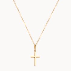 This 9k Gold Cross Necklace includes a beautifully delicate fine gold chain and a cross pendant crafted out of 9k solid gold. Pair with a personalized engraved necklace or simply wear it alone for a statement look.9K Fine GoldCross charm size: Length 12mm, Width 8 mm, Thickness: 0.8 mmAdjustable chain length from 15.5 to 15Secure clasp fasteningCharms are removable from this chainHand engraved in our London workshopSent with love in a complimentary gift boxAny slight variations in lettering dept 14k Gold Cross Pendant Necklace For First Communion, Yellow Gold Cross Charm Necklace With Delicate Chain, Delicate Yellow Gold Cross Charm Necklace, Yellow Gold Charm Necklace With Cross Pendant, Yellow Gold Cross Charm Necklace Tarnish Resistant, Yellow Gold Cross Pendant Charm Necklace With Delicate Chain, Yellow Gold Tarnish-resistant Cross Charm Necklace, 14k Yellow Gold Cross Pendant Charm Necklace, Classic Yellow Gold Cross Pendant Necklace